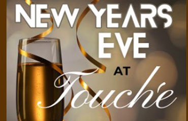 New Year's Eve at Touche' The Night Club in Overland Park Kansas cost $125.00 per person includes cocktails and party favors from 9:00pm until 2:00am Wednesday Night December 31st. Please call to reserve your spot.